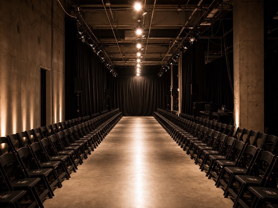 Live iFansX runway showcase with audience