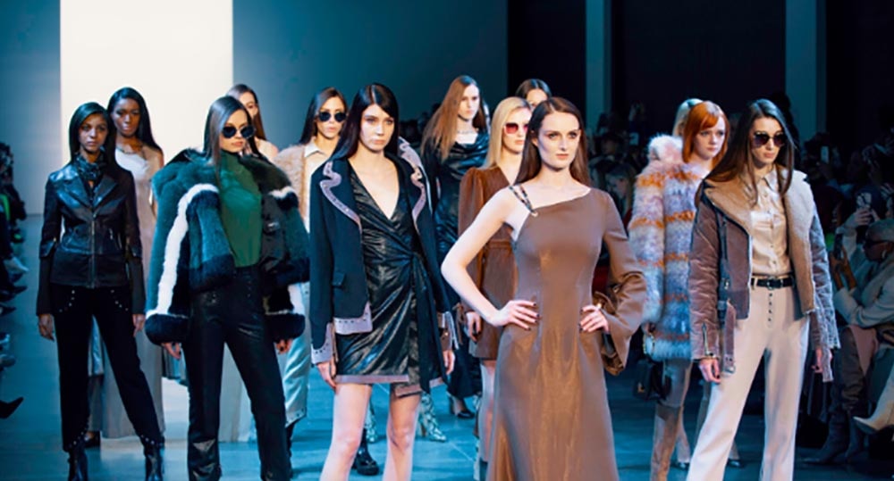Fashion runway lineup during a live showcase