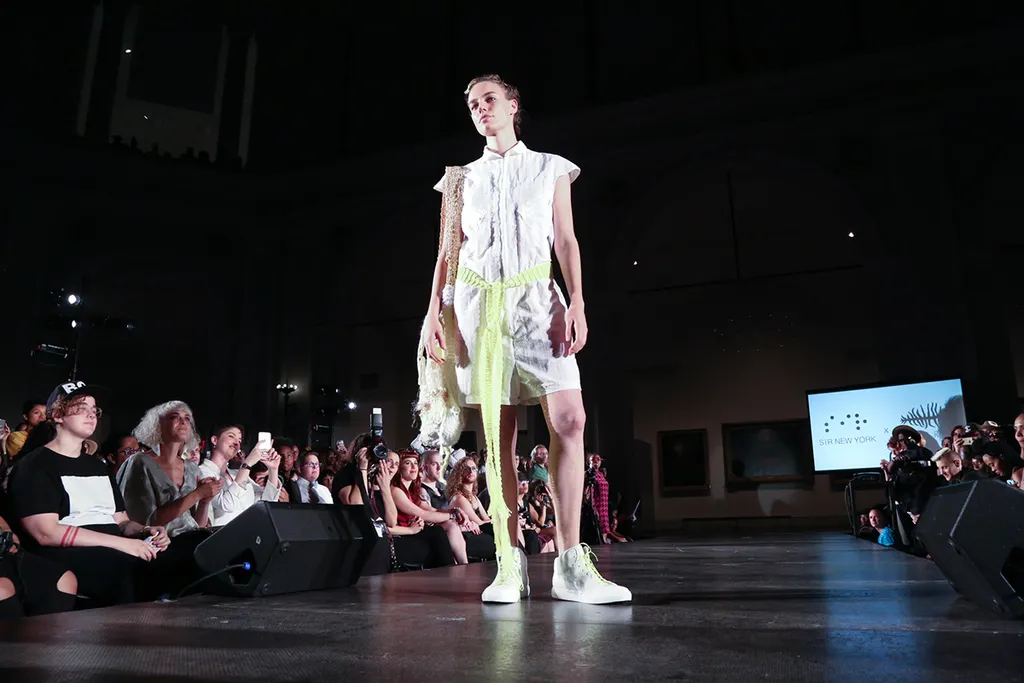 Community runway audience supporting rising talent