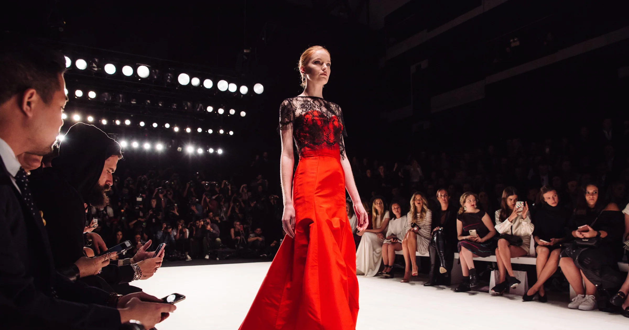 Runway showcase moment with community energy