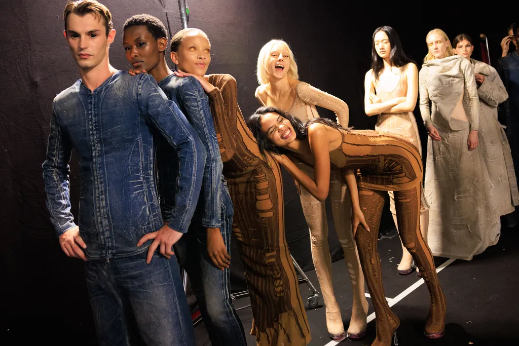 Models waiting backstage before a fashion runway show