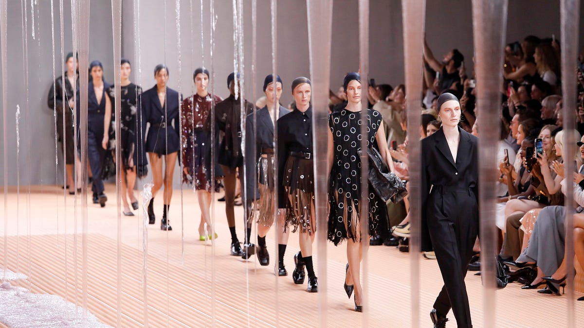 Models walking a runway lineup