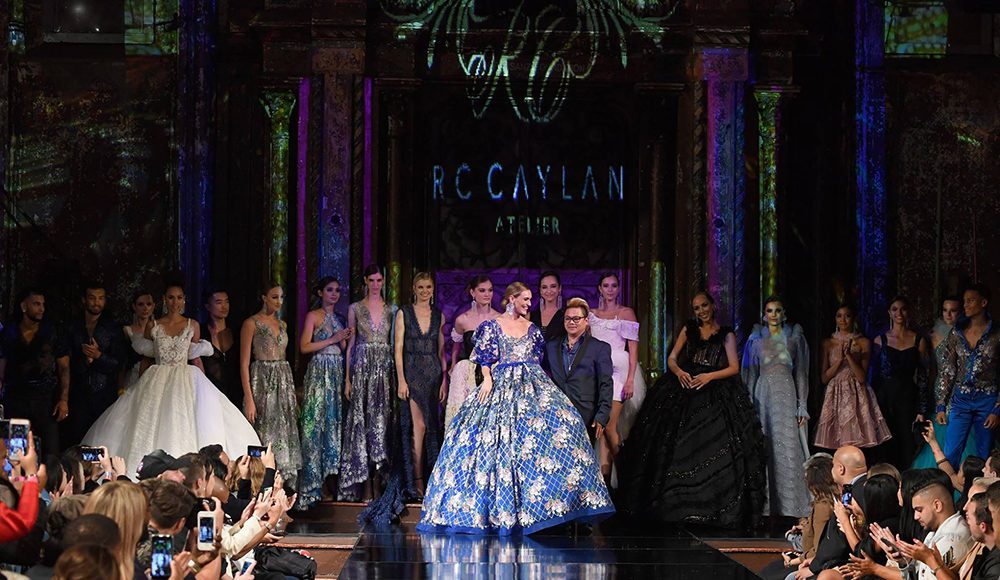 Fashion showcase finale with models on stage